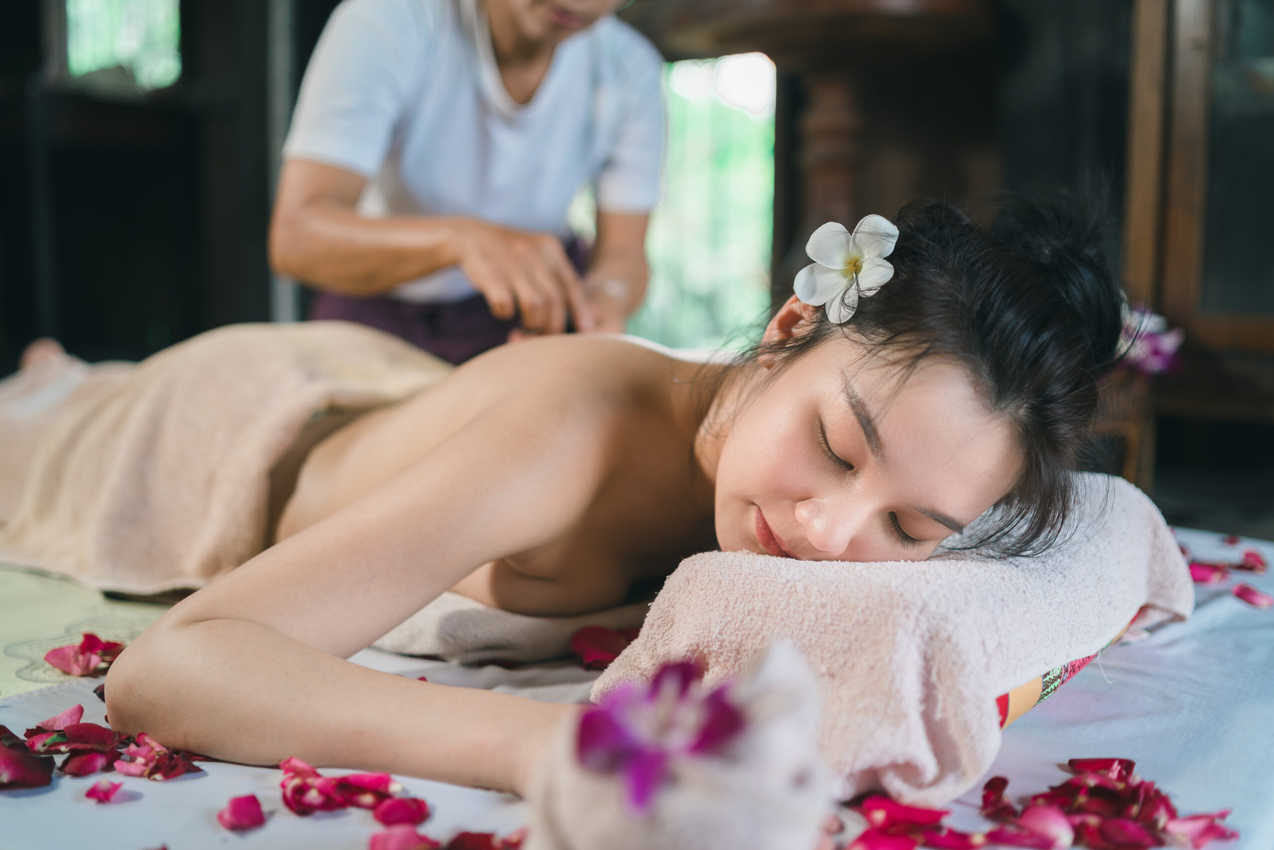 https://kingslynnthaimassage.com/wp-content/uploads/2023/03/massage-spa-relaxing-treatment-office-syndrome-using-hot-stone-traditional-thai-massage-style-asain-female-masseuse-doing-massage-treat-back-pain-arm-pain-stress-woman-tired-from-work-scaled.jpg